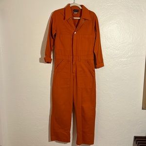 Orange Big Bud Press long sleeve jumpsuit